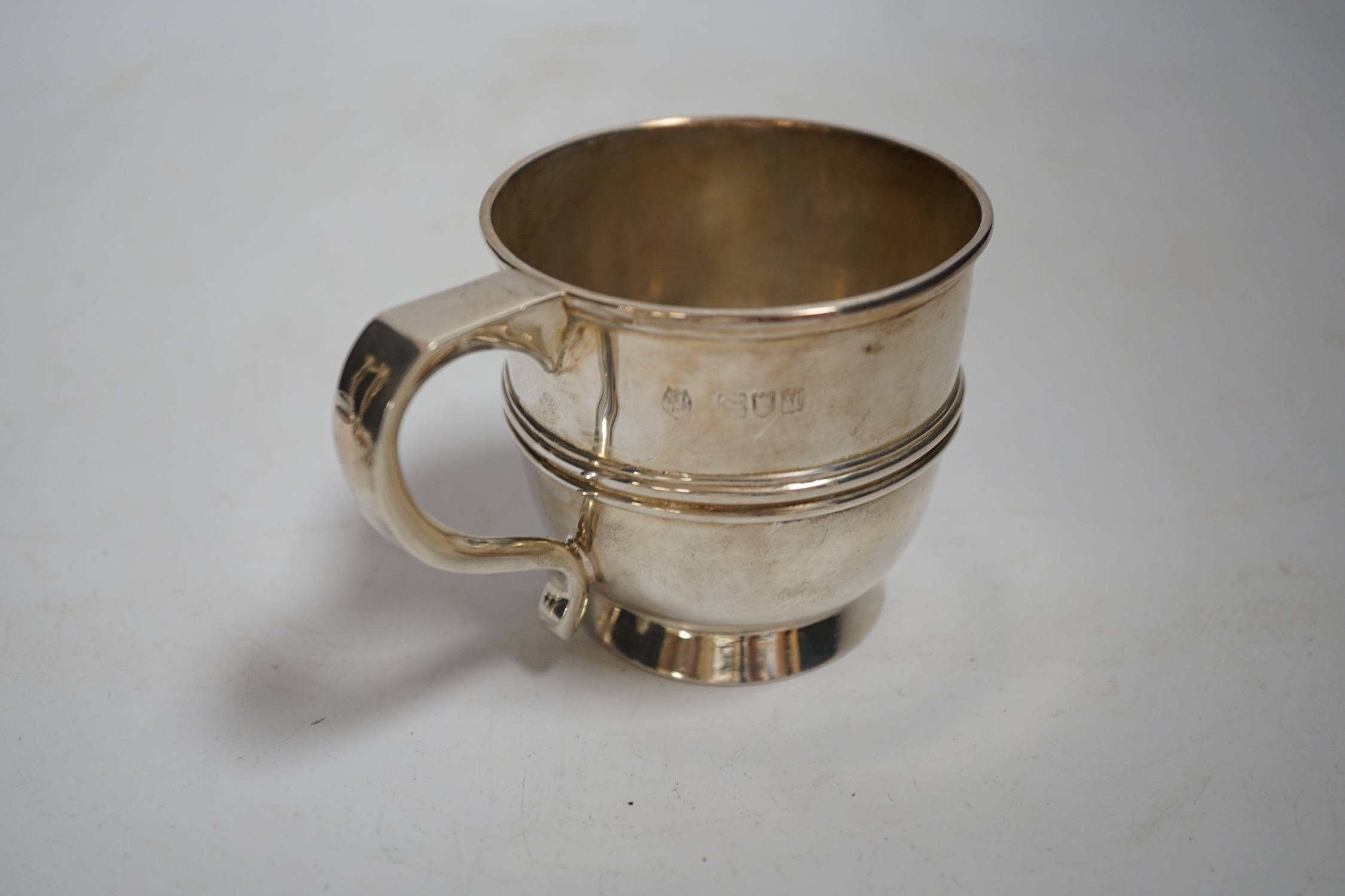 A George V silver christening mug, Stewart Dawson & Co Ltd, London, 1911, height 67mm, 4.8oz.